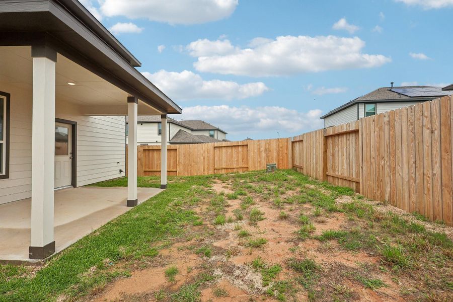 Exterior details and patio area of a home in Bluestem, Brookshire (Image 3). Exterior details and patio area of a home in Bluestem, Brookshire (Image 3).