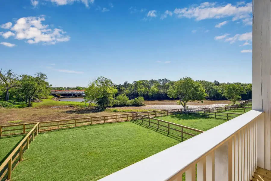 Backyard space and views of Dickinson Bayou from the second floor balcony. Backyard space and views of Dickinson Bayou from the second floor balcony.