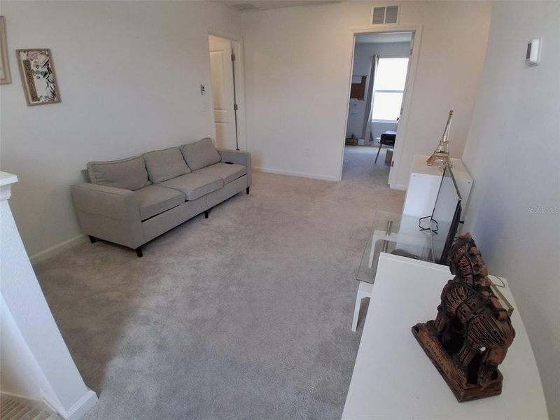 Furnished interior view inside a new home in Hunt Club Groves, Lake Wales (Image 40).