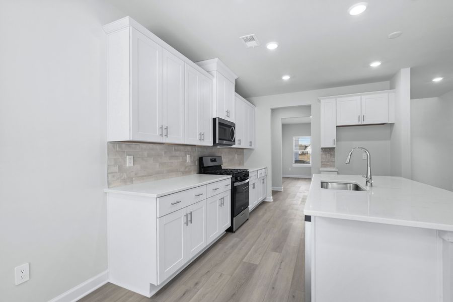 Furnished interior view inside a new home in Waterside - Coastline Series, Longs (Image 5).