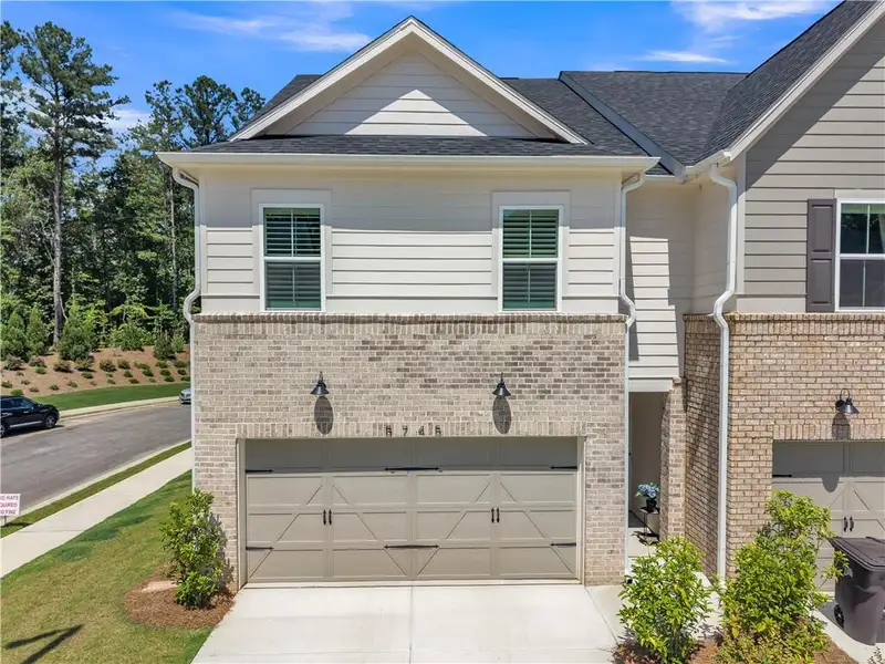 Front exterior of a new home in , Powder Springs, GA, highlighting curb appeal (Image 2). Front exterior of a new home in , Powder Springs, GA, highlighting curb appeal (Image 2).