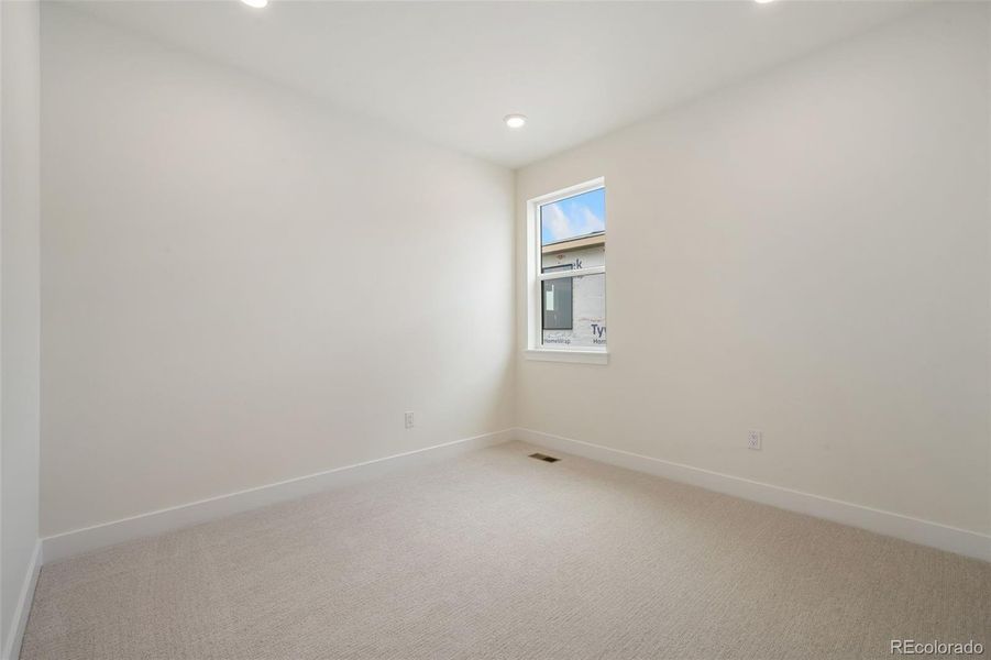 Spacious, unfurnished interior of a new home in Festival at RainDance, Windsor (Image 8).