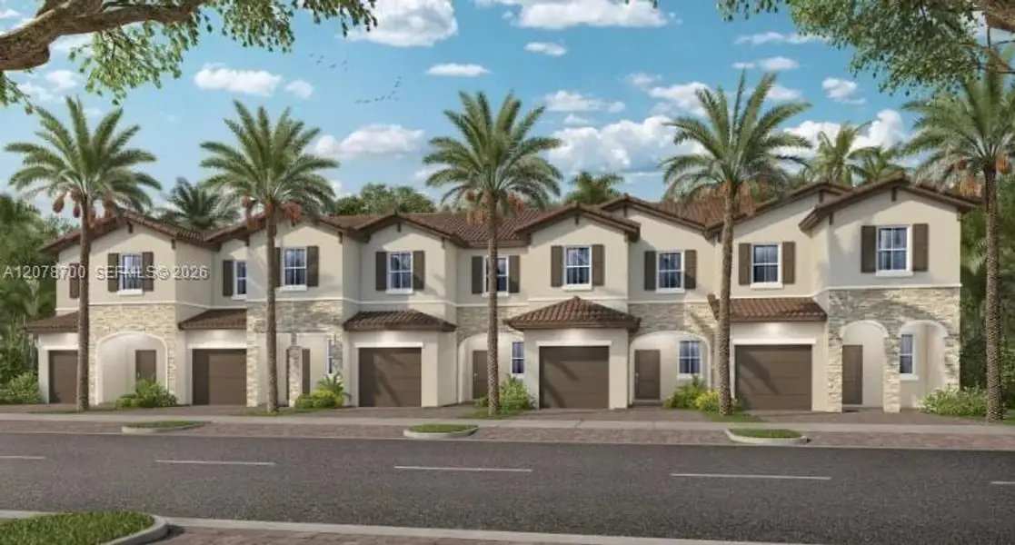Front exterior of a new home in Altamira, Homestead, FL, highlighting curb appeal (Image 1). Front exterior of a new home in Altamira, Homestead, FL, highlighting curb appeal (Image 1).