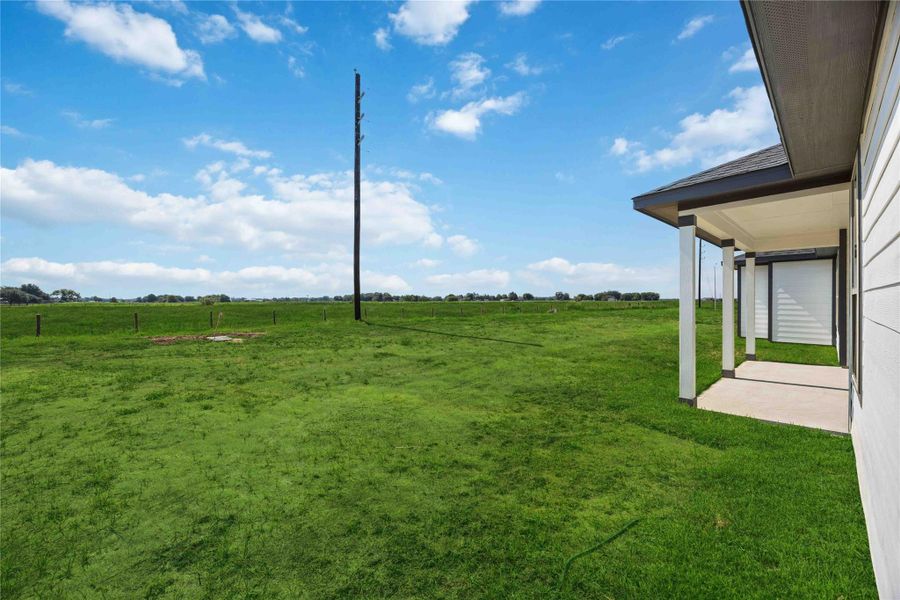 Enjoy outdoor living with a covered patio.