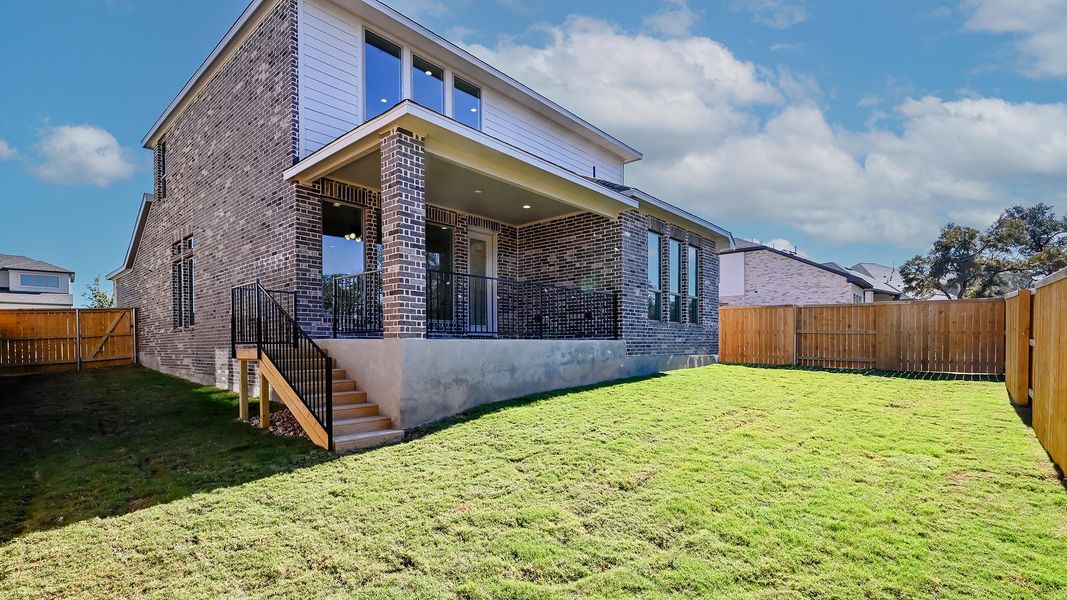 Exterior details and patio area of a home in 6 Creeks 50', Kyle (Image 2).