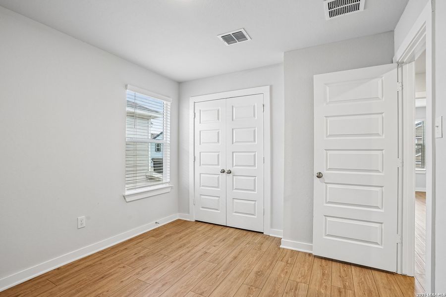 Spacious, unfurnished interior of a new home in University Village, San Antonio (Image 24).
