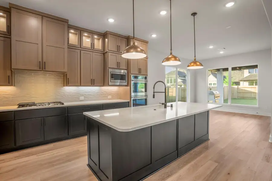 Furnished interior view inside a new home in ARTAVIA 70′ Lots, Conroe (Image 7).