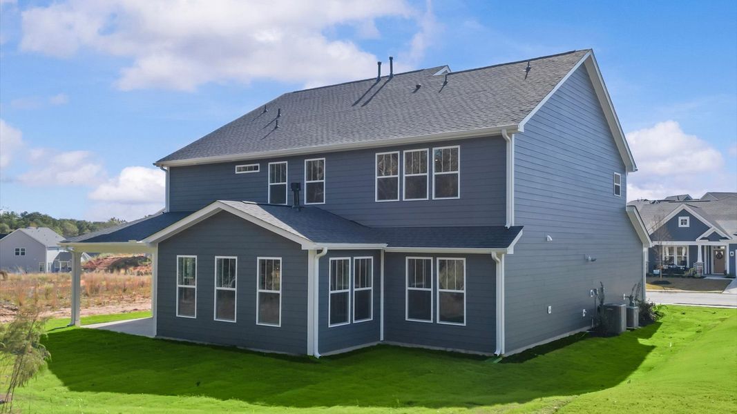 First-class design featuring a rear covered porch and tasteful architectural details
