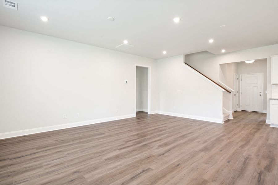 Open Concept Gathering Room with Hardwood Floors Open Concept Gathering Room with Hardwood Floors