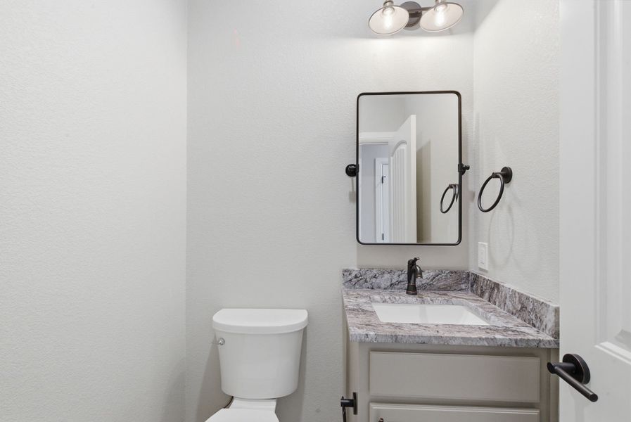 Representative furnished interior of a home built from the Canyon Plan by Zeal Home Builders in Sunrise Point, Weatherford (Image 9).