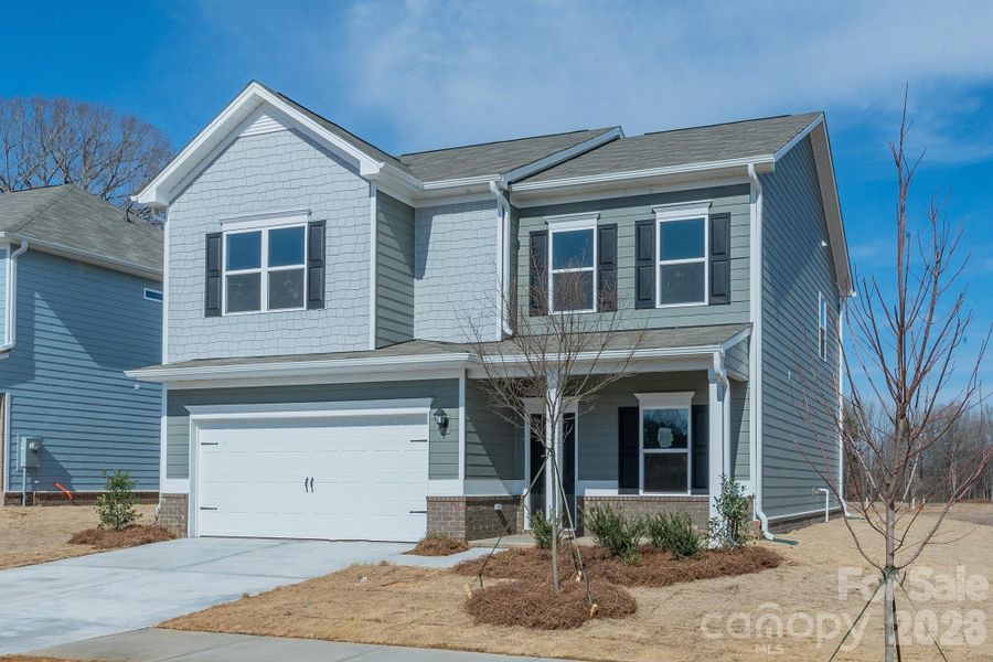 Front exterior of a new home in Cedar Meadows, Monroe, NC, highlighting curb appeal (Image 17).