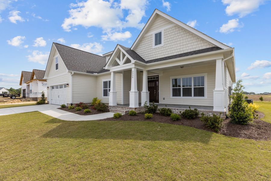 Representative exterior photo of a completed home built from the Haddock by Bill Clark Homes in Laurel Oaks, Greenville, NC (Image 27).
