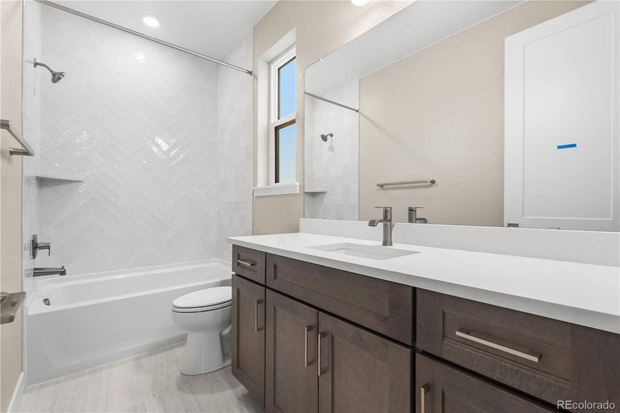 Furnished interior view inside a new home in Autograph at Lyric, Lone Tree (Image 6).