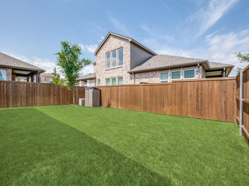 View of fenced backyard