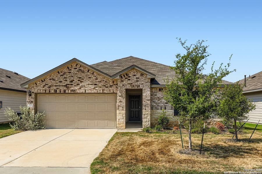 Front exterior of a new home in , New Braunfels, TX, highlighting curb appeal (Image 16). Front exterior of a new home in , New Braunfels, TX, highlighting curb appeal (Image 16).
