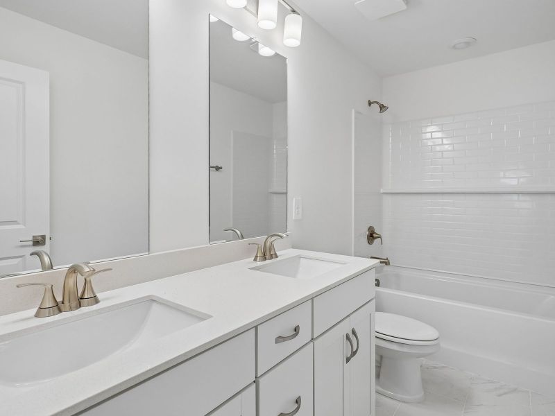 Furnished interior view inside a new home in Station Hill - Estate Series, Franklin (Image 6).