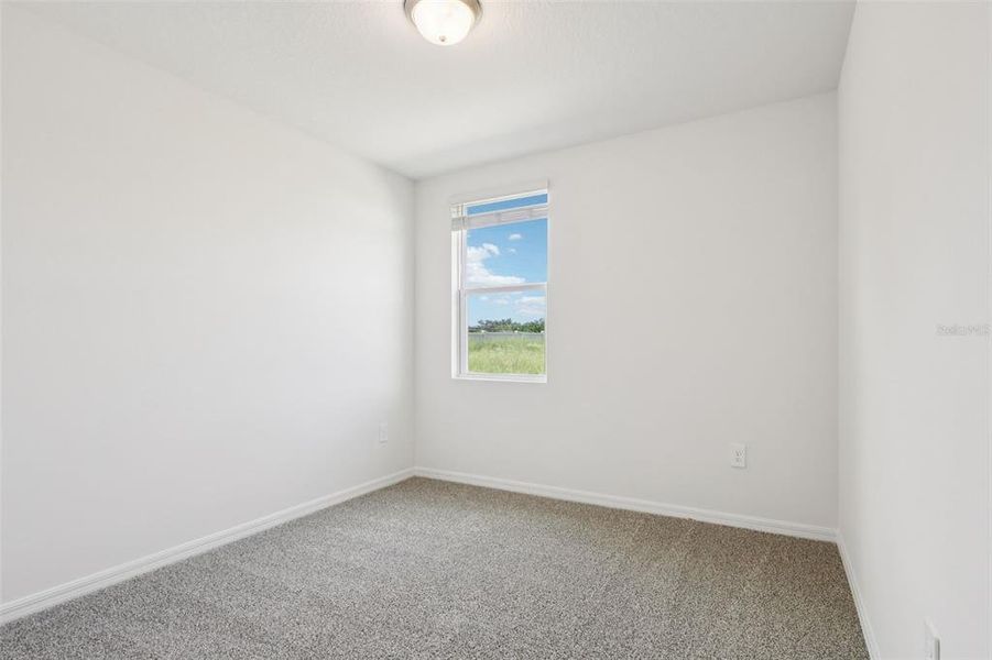 Spacious, unfurnished interior of a new home in Bradbury Creek - Signature Series, Haines City (Image 26).