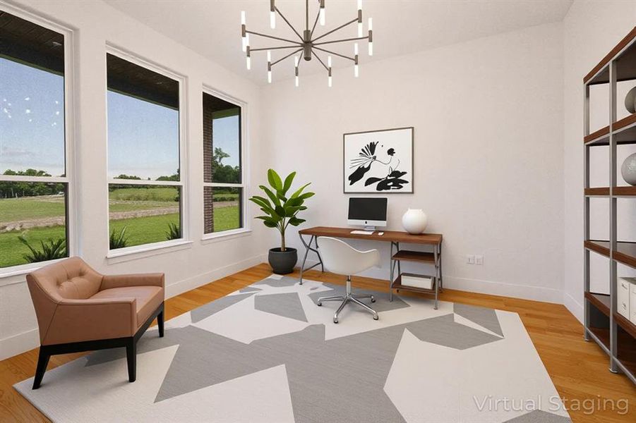 Office space featuring hanging lights and light wood-type flooring