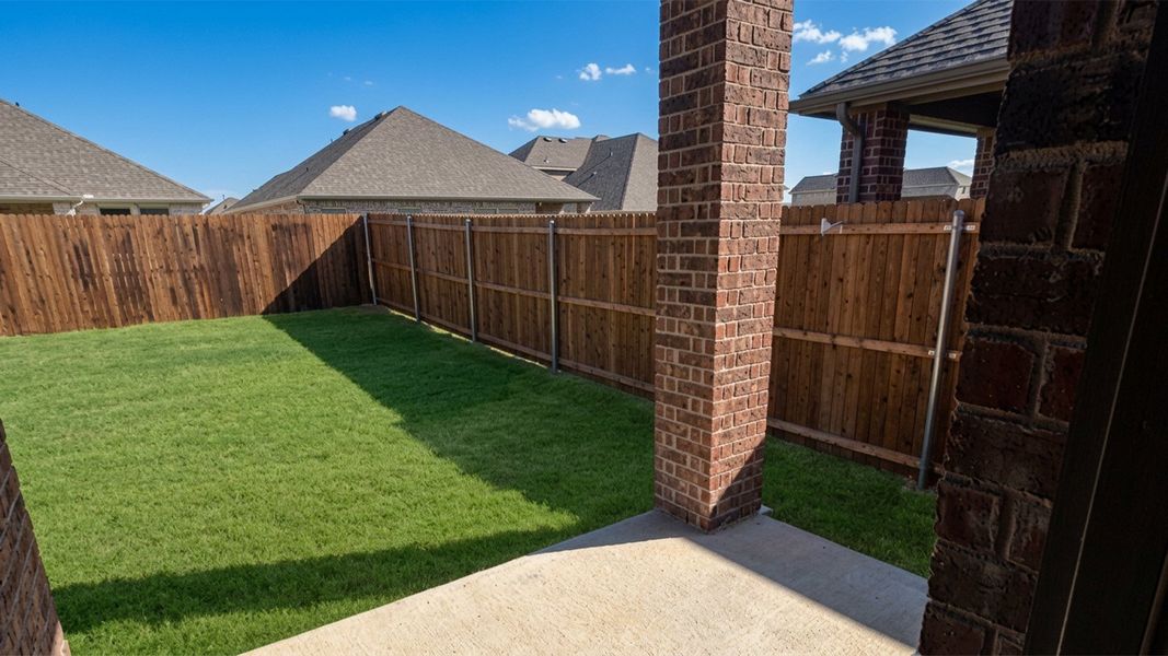 Exterior details and patio area of a home in Lakewood Trails, Forney (Image 2). Exterior details and patio area of a home in Lakewood Trails, Forney (Image 2).