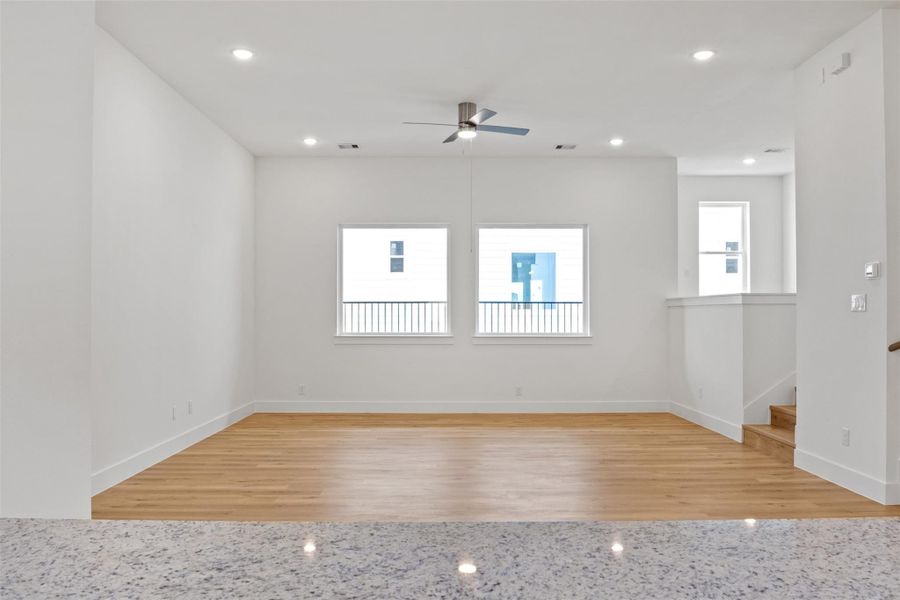 View from the open kitchen into the vast living area! View from the open kitchen into the vast living area!