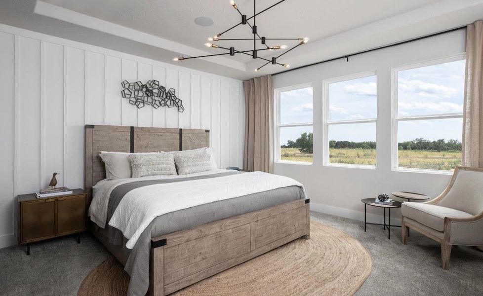 Representative furnished interior of a home built from the Blue Jay by Ashton Woods in Lariat, Liberty Hill (Image 10).