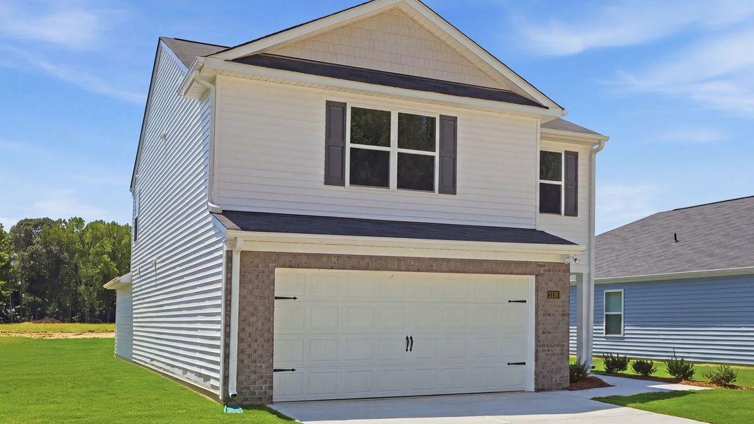 Front exterior of a new home in Carter Ridge, Greenville, NC, highlighting curb appeal (Image 19).