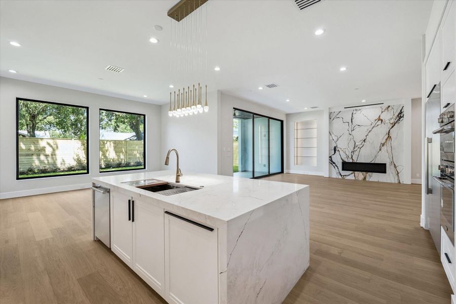 Custom inset cabinetry, complete with deep drawers for pots and pans, enhances both function and aesthetics, delivering a tailored look that integrates seamlessly into the overall kitchen design. Thermador double wall ovens and a full size side by side refrigerator/freezer complete the gourmet Kitchen. Custom inset cabinetry, complete with deep drawers for pots and pans, enhances both function and aesthetics, delivering a tailored look that integrates seamlessly into the overall kitchen design. Thermador double wall ovens and a full size side by side refrigerator/freezer complete the gourmet Kitchen.