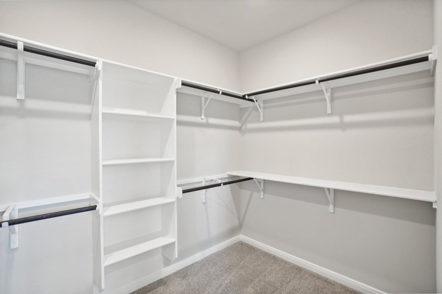 Primary suite walk-in closet in a Rio Grande floorplan at a Meritage Homes community.