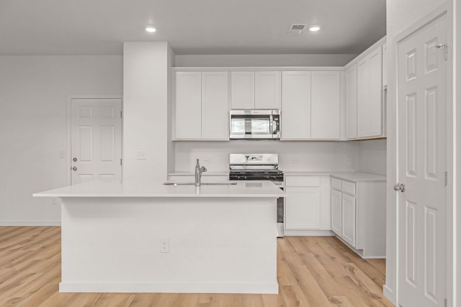 Furnished interior view inside a new home in Painted Prairie, Aurora (Image 6). Furnished interior view inside a new home in Painted Prairie, Aurora (Image 6).