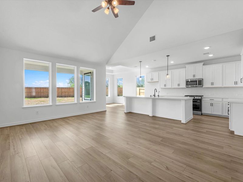 Gathering room. Sample product photo. Actual exterior and interior selections may vary by homesite. Photo may be virtually staged.
