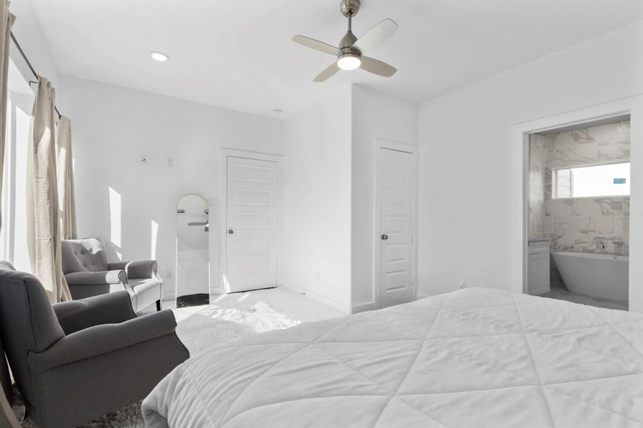 Luxurious primary suite perfect for rest and rejuvenation. Luxurious primary suite perfect for rest and rejuvenation.