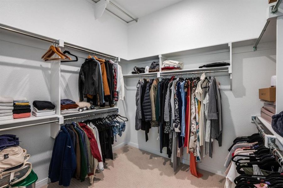 Walk in closet with light carpet Walk in closet with light carpet