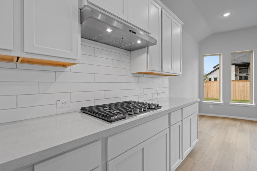 Furnished interior view inside a new home in Bridgeland 55', Cypress (Image 6).