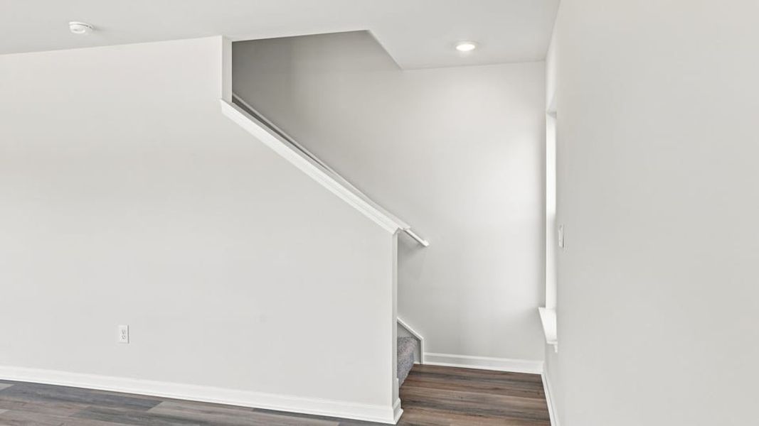 Spacious, unfurnished interior of a new home in Bentley Park, Greenwood (Image 21).