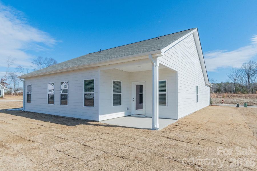 Exterior details and patio area of a home in Pine Bluff, Midland (Image 4). Exterior details and patio area of a home in Pine Bluff, Midland (Image 4).