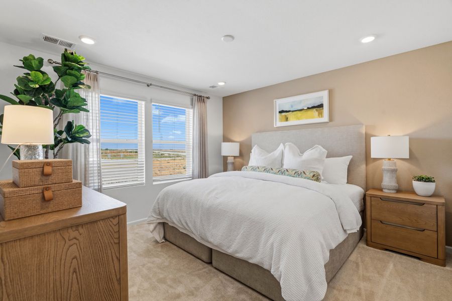Representative furnished interior of a home built from the 2002 by Risewell Homes in Harvest Crossing, Aurora (Image 14).