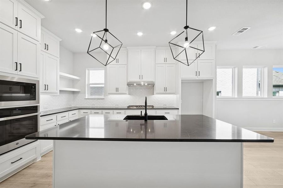 Furnished interior view inside a new home in Pecan Square - Gardens, Northlake (Image 9). Furnished interior view inside a new home in Pecan Square - Gardens, Northlake (Image 9).