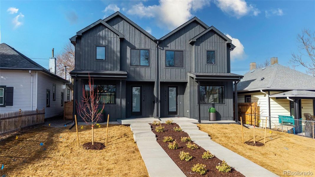 Front exterior of a new home in , Englewood, CO, highlighting curb appeal (Image 1). Front exterior of a new home in , Englewood, CO, highlighting curb appeal (Image 1).