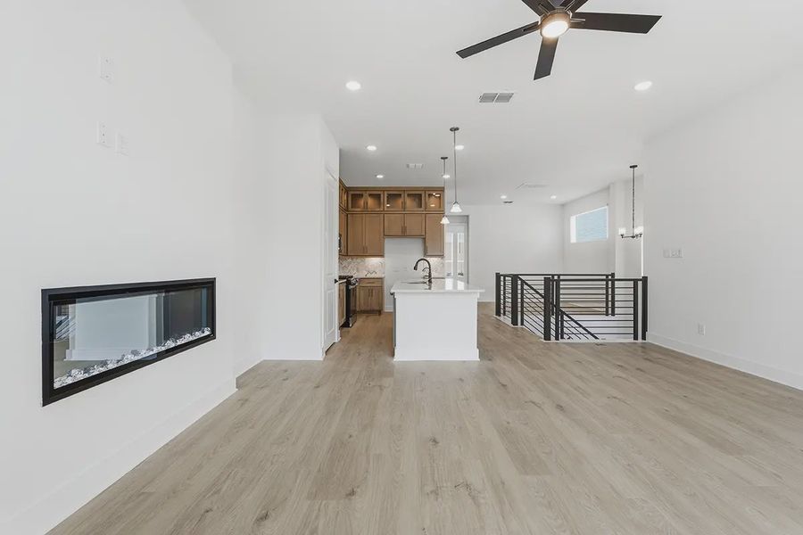 Spacious, unfurnished interior of a new home in Centero at Stone Oak, San Antonio (Image 13).