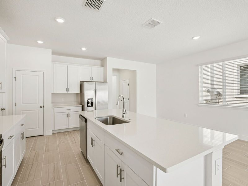 Furnished interior view inside a new home in Cyrene at Minneola - Villas, Minneola (Image 6).