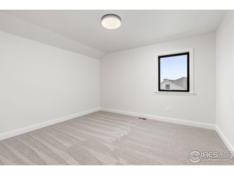 The upstairs bedrooms are spacious and inviting