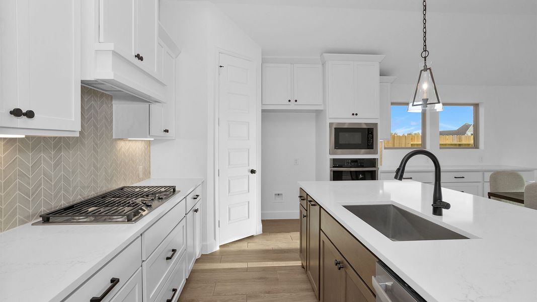 Furnished interior view inside a new home in Artavia, Conroe (Image 7).