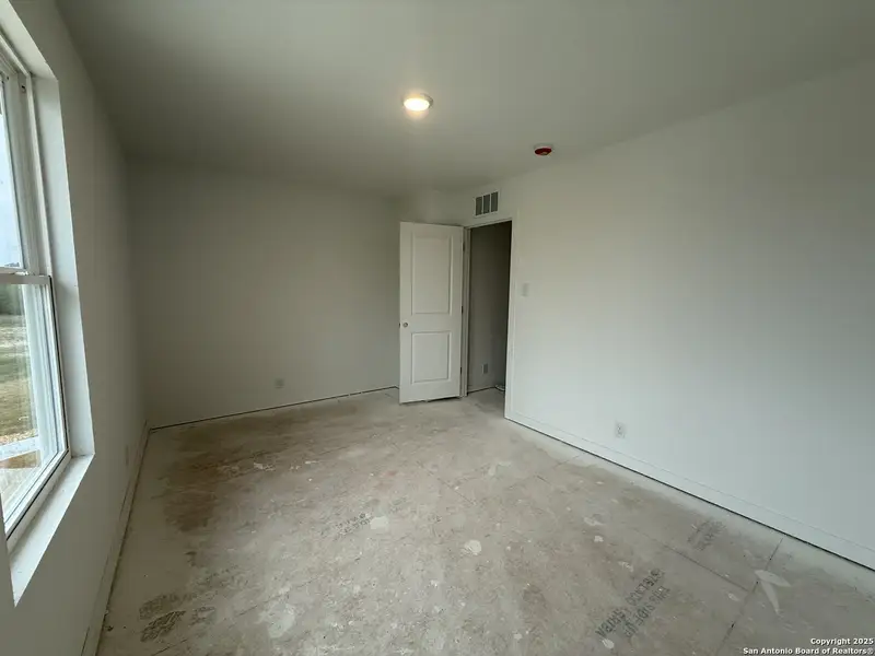 In-progress construction of a new home in Meadows at Hennersby Hollow 40's, San Antonio, TX (Image 24).