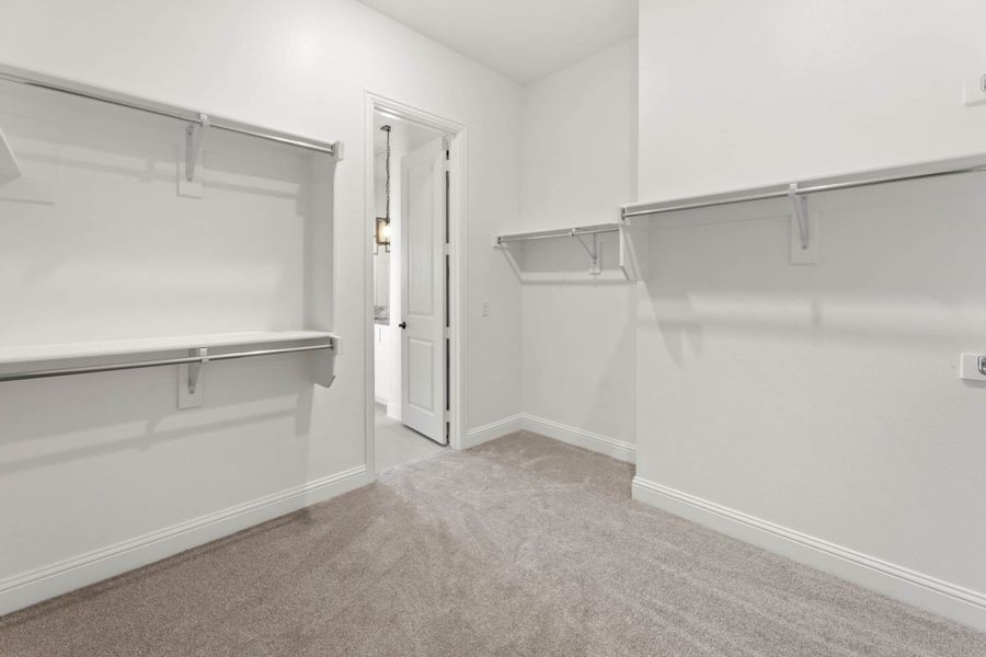 Representative unfurnished interior of a home built from the Kirby by UnionMain Homes in Lake Breeze, Lavon (Image 22).