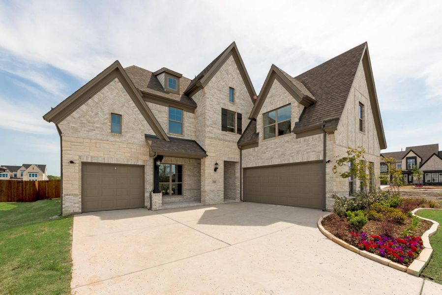 Front exterior of a new home in Park Trails, Forney, TX, highlighting curb appeal (Image 1). Front exterior of a new home in Park Trails, Forney, TX, highlighting curb appeal (Image 1).