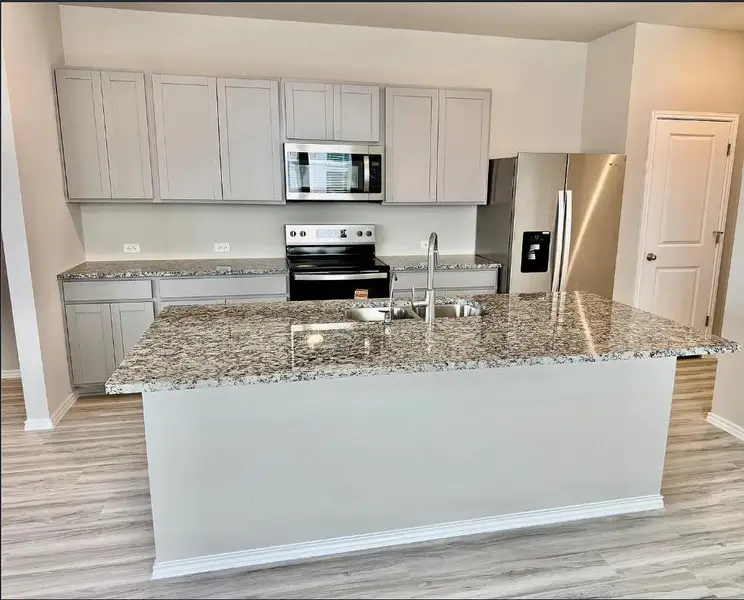 Photo is not of the actual home, but is an inspirational photo of builder’s model home and may depict options, furnishings, and/or decorator features that are not included