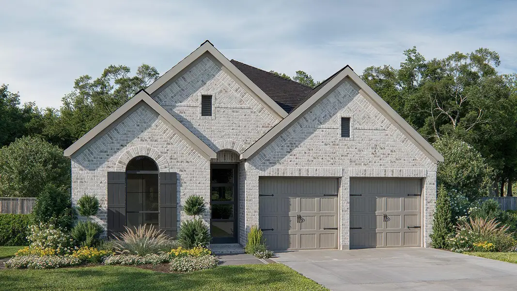 Front exterior of a new home in Everly 45', Hockley, TX, highlighting curb appeal (Image 1).
