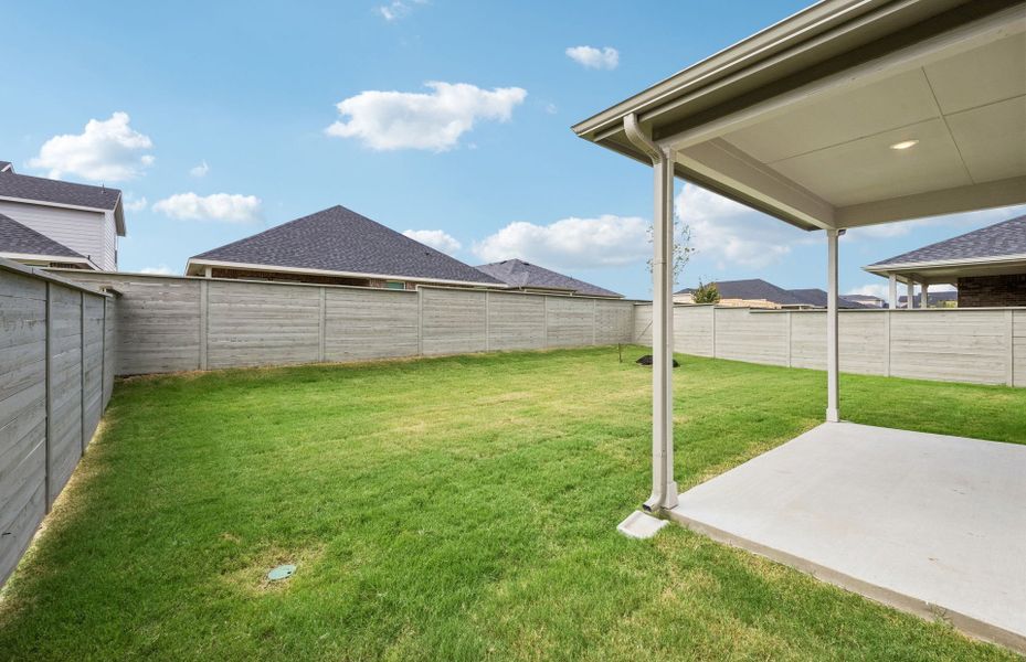 Exterior details and patio area of a home in Treeline, Justin (Image 3).
