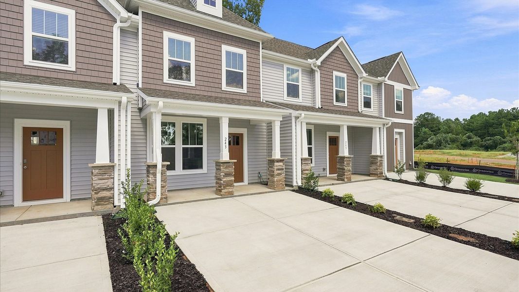 Refined exterior design with balanced architectural detail in this distinguished two-story villa at Clarke Townes Refined exterior design with balanced architectural detail in this distinguished two-story villa at Clarke Townes