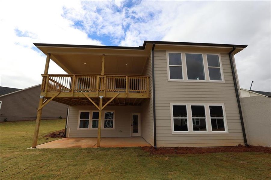 Exterior details and patio area of a home in Crescent Pointe at Great Sky, Canton (Image 2).